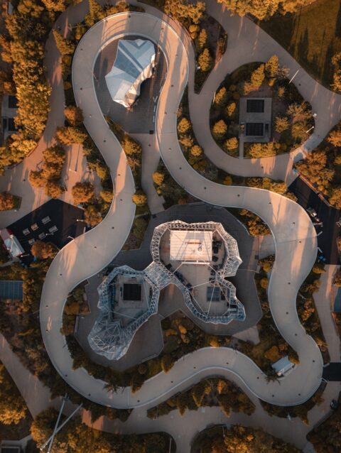 An aerial view of a road and a building