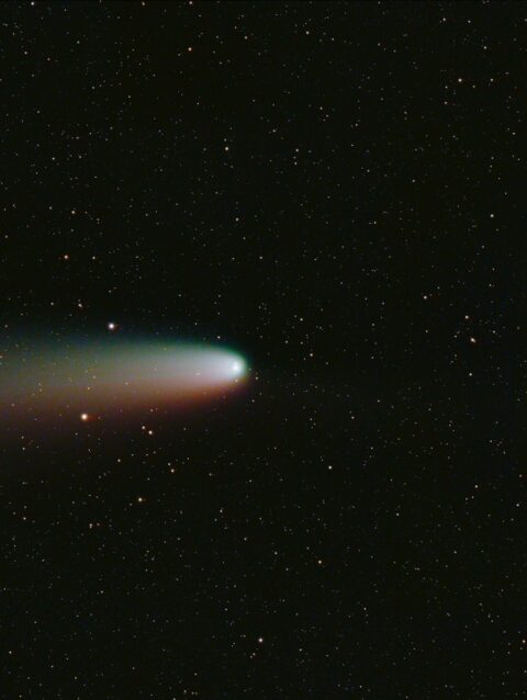 A black and white photo of a bright object in the sky