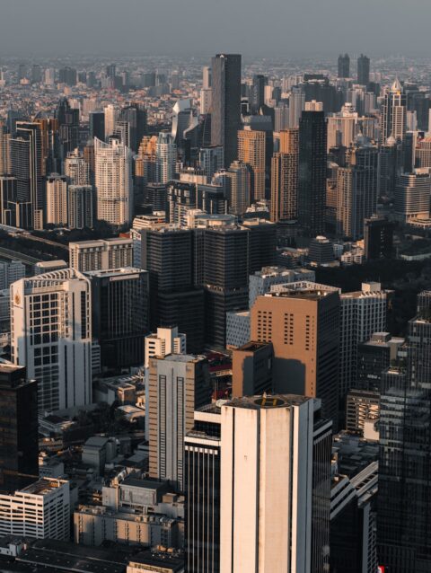 A view of a city from the top of a tall building