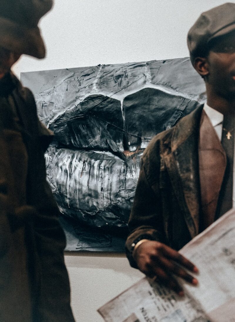 A couple of men standing next to each other