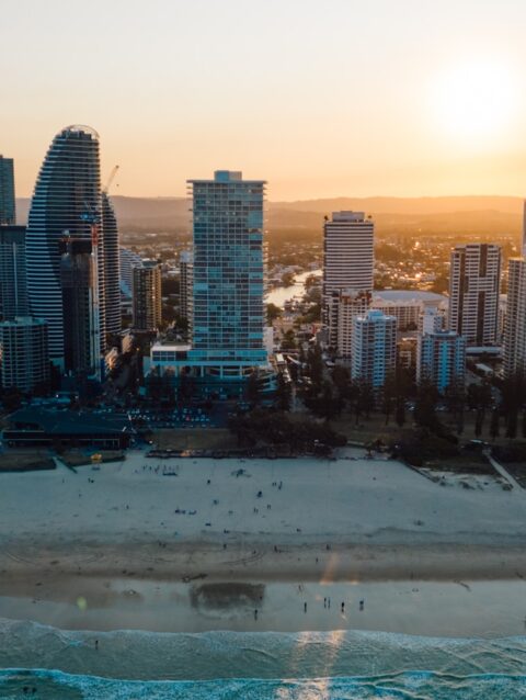An aerial view of a city at sunset